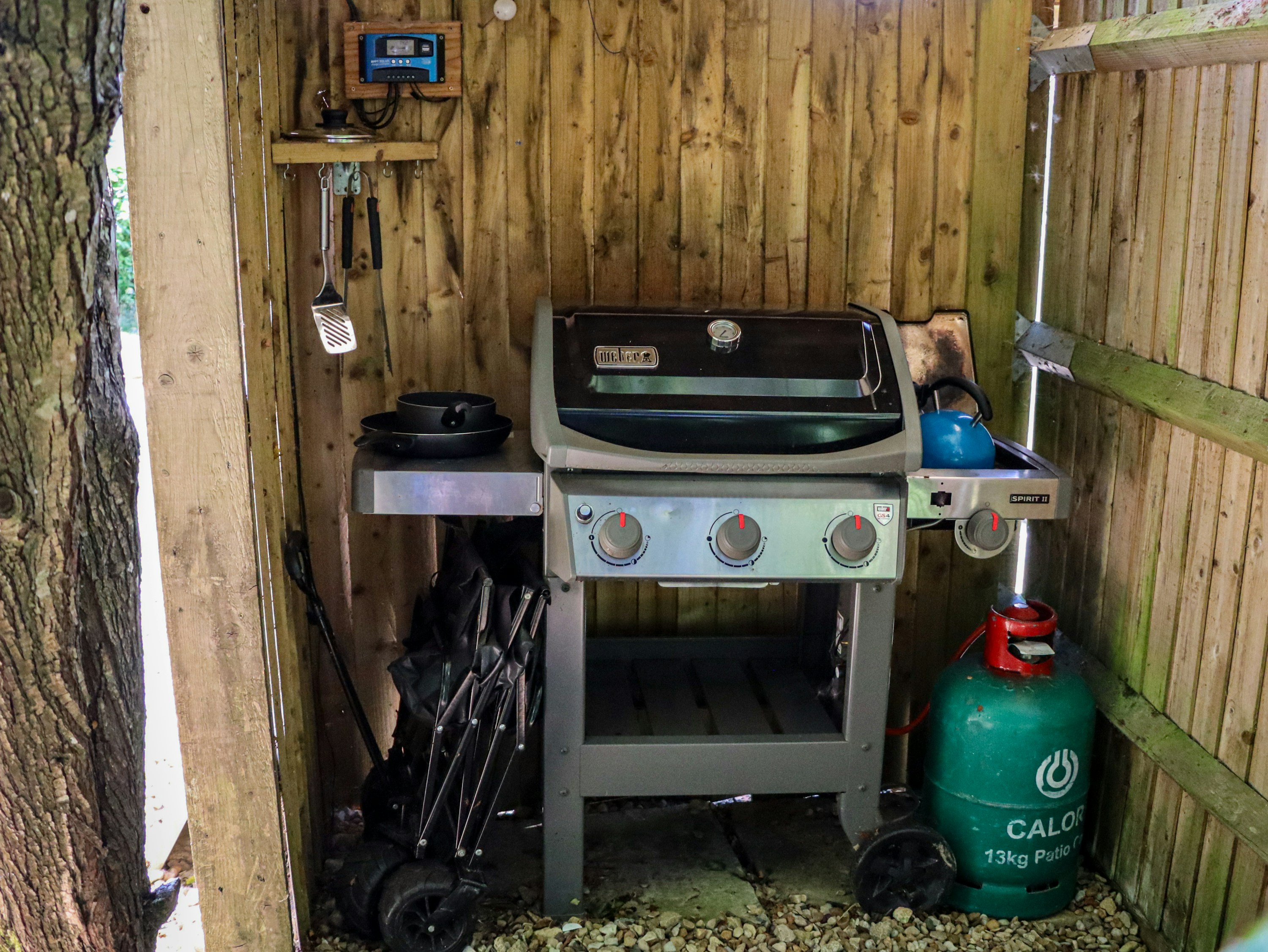 A real outdoor gas grill ready for backyard cooking